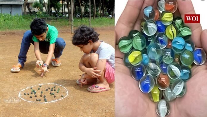 Goli Traditional Game ,Indian Village Games ,Reviving Traditional Play ,Goli Glass Marbles ,Childhood Games India ,Rural Indian Sports ,Skill-Based Play ,Traditional Marbles ,Indian Heritage Games ,Recycled Glass Crafts