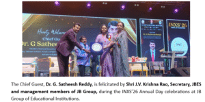 Students performing on stage during JB Educational Society INXS 2026 Annual Day in Hyderabad